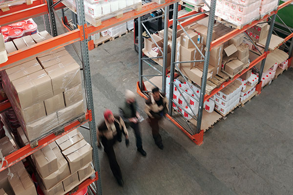 workers walking through a warehouse